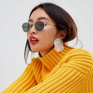 Oval metal sunglasses with polarized lenses